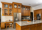 This house has 10-foot ceilings so we built these upper display cabinets to add character.